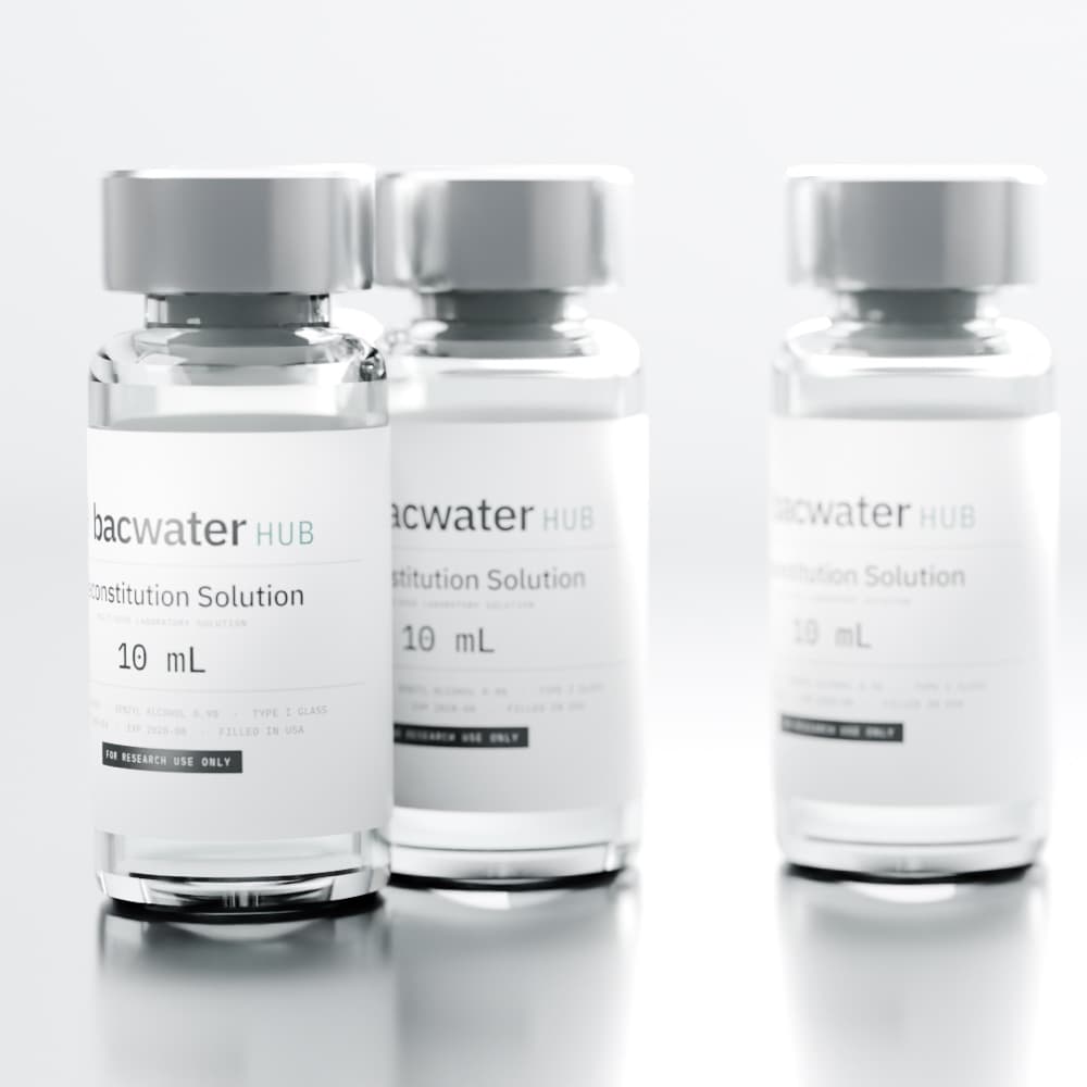 Three Bac Water Hub reconstitution solution vials on a stainless clean bench